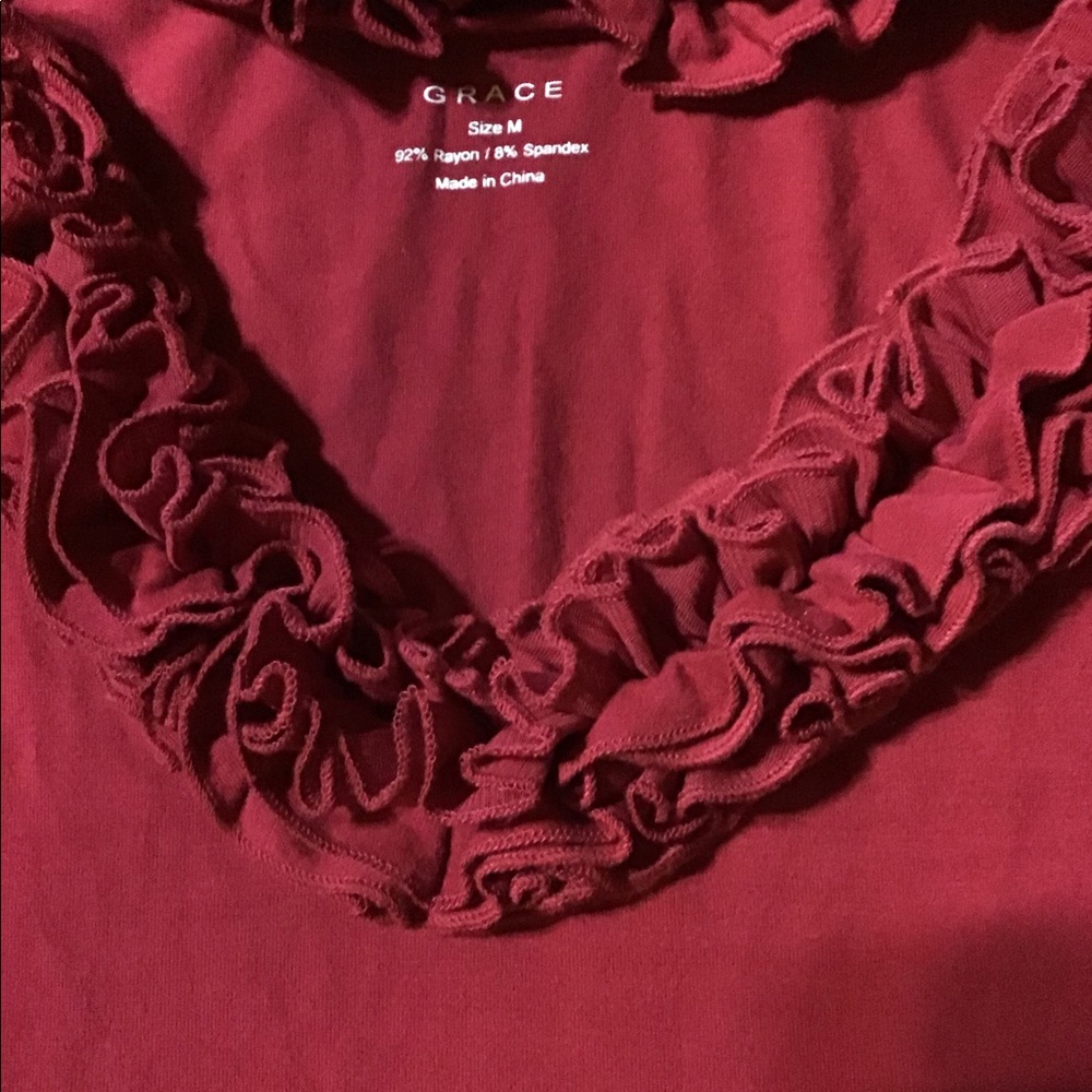 Women’s Grace size medium ruffle neck top